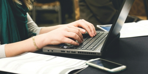 Photo of hands on a laptop keyboard, author: Startup Stock Photos from Pexels